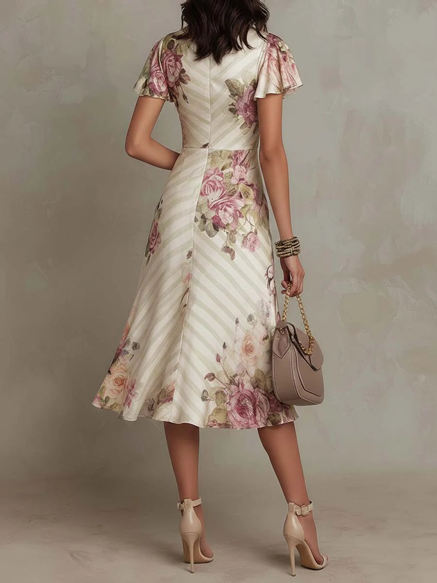 Elegante Vestido Midi Floral Marfil para Mujeres con Escote en V, Manga con Volantes y Estilo Drapado Fluido