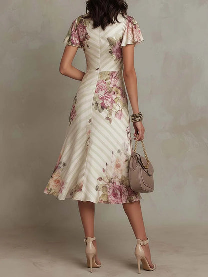 Elegante Vestido Midi Floral Marfil para Mujeres con Escote en V, Manga con Volantes y Estilo Drapado Fluido