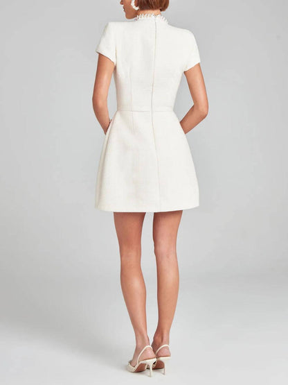Elegante Vestido Mini de Tweed para Mujeres con Cuello Alto, Mangas Cortas y Bolsillos Decorados para Cóctel