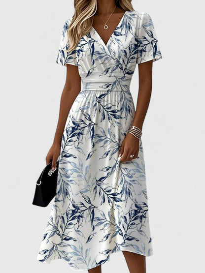 Elegante Vestido Midi Floral Blanco para Mujeres con Escote en V y Mangas Fluidas