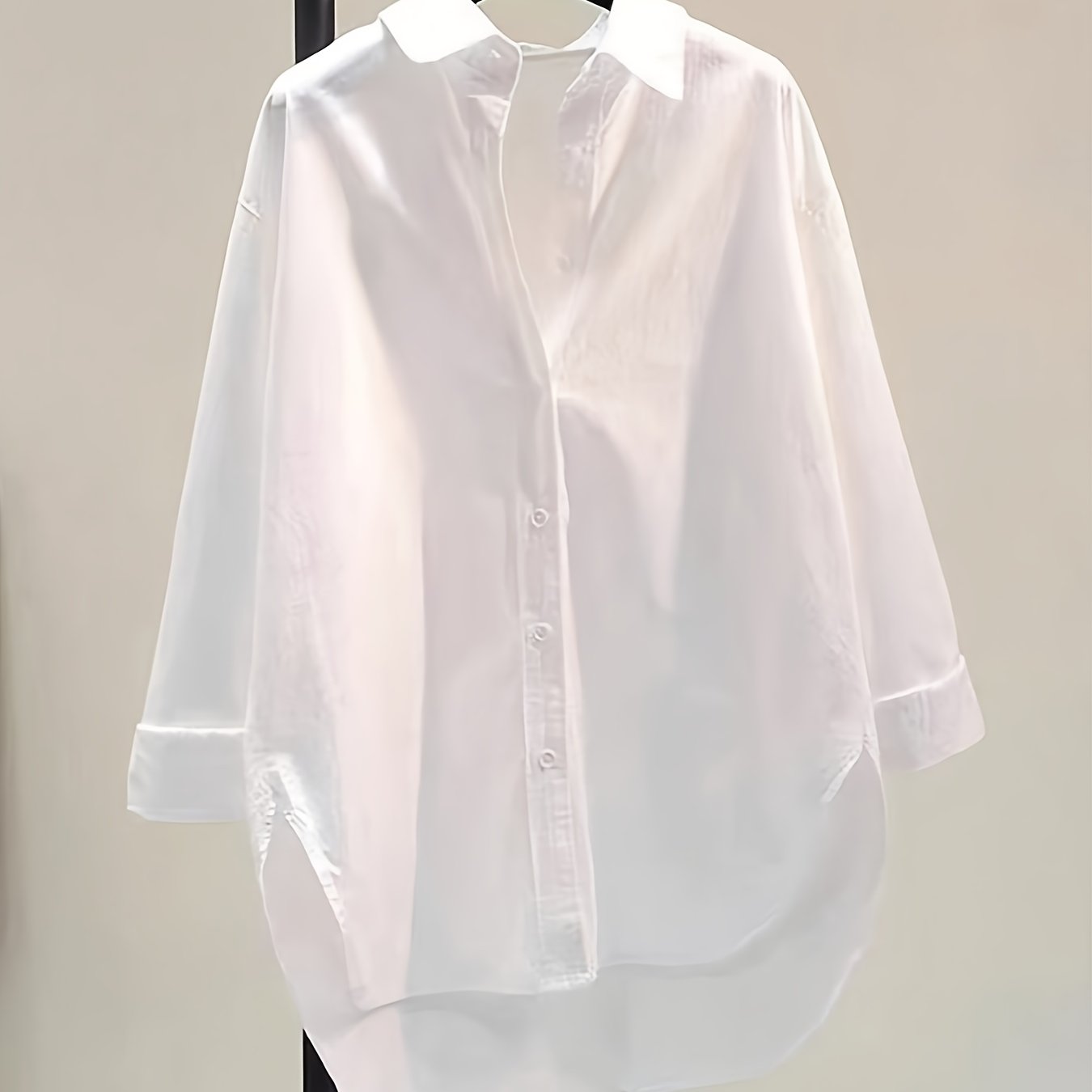 Blusa de Algodón Sin Esfuerzo para Mujeres con Cuello de Punto, Manga Larga, Estilo Oversized y Bajo Irregular