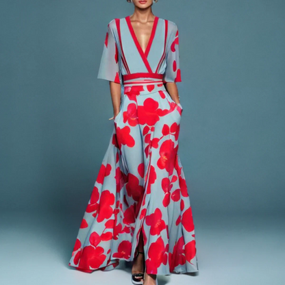 Jumpsuit Floral Azul Elegante para Mujeres con Cuello en V Cruzado, Mangas de Codo y Piernas Anchas con Cinturón