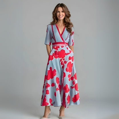 Jumpsuit Floral Azul Elegante para Mujeres con Cuello en V Cruzado, Mangas de Codo y Piernas Anchas con Cinturón