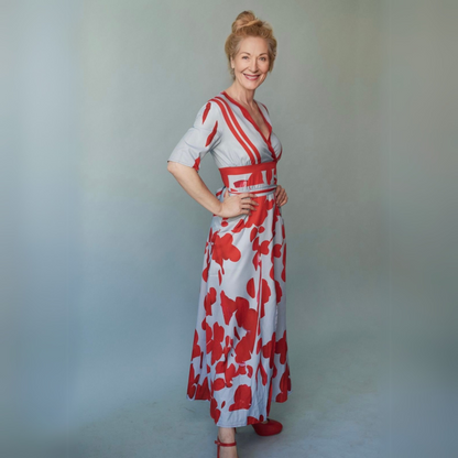 Jumpsuit Floral Azul Elegante para Mujeres con Cuello en V Cruzado, Mangas de Codo y Piernas Anchas con Cinturón