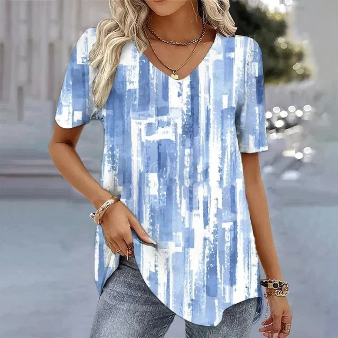 Túnica Floral Sin Esfuerzo para Mujeres con Cuello en V y Mangas Cortas, Estilo Fluyente con Dobladillo Curvo