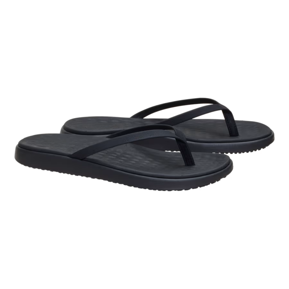 Chanclas cómodas para mujeres con tira entre los dedos, plantilla texturizada y estilo deslizante