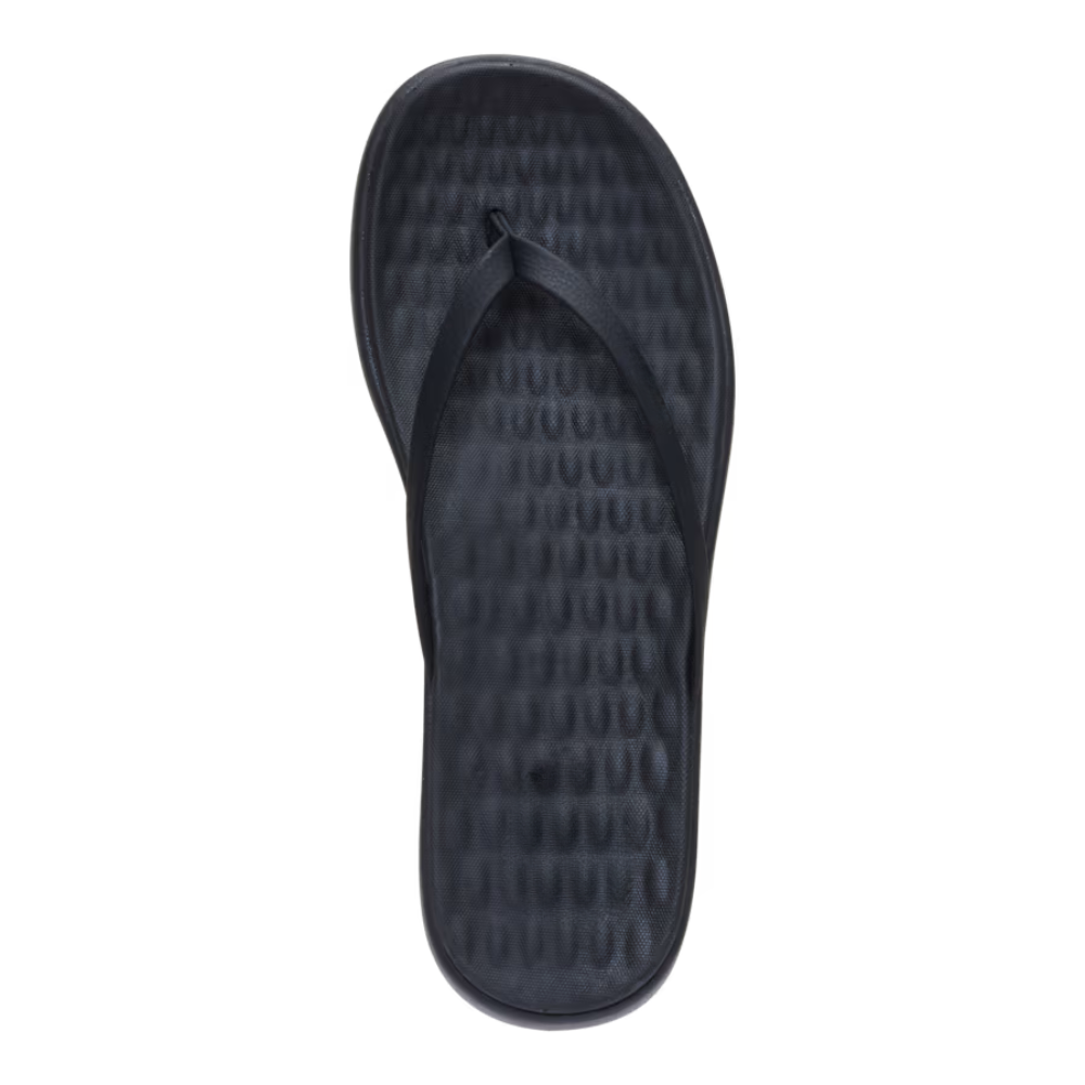 Chanclas cómodas para mujeres con tira entre los dedos, plantilla texturizada y estilo deslizante