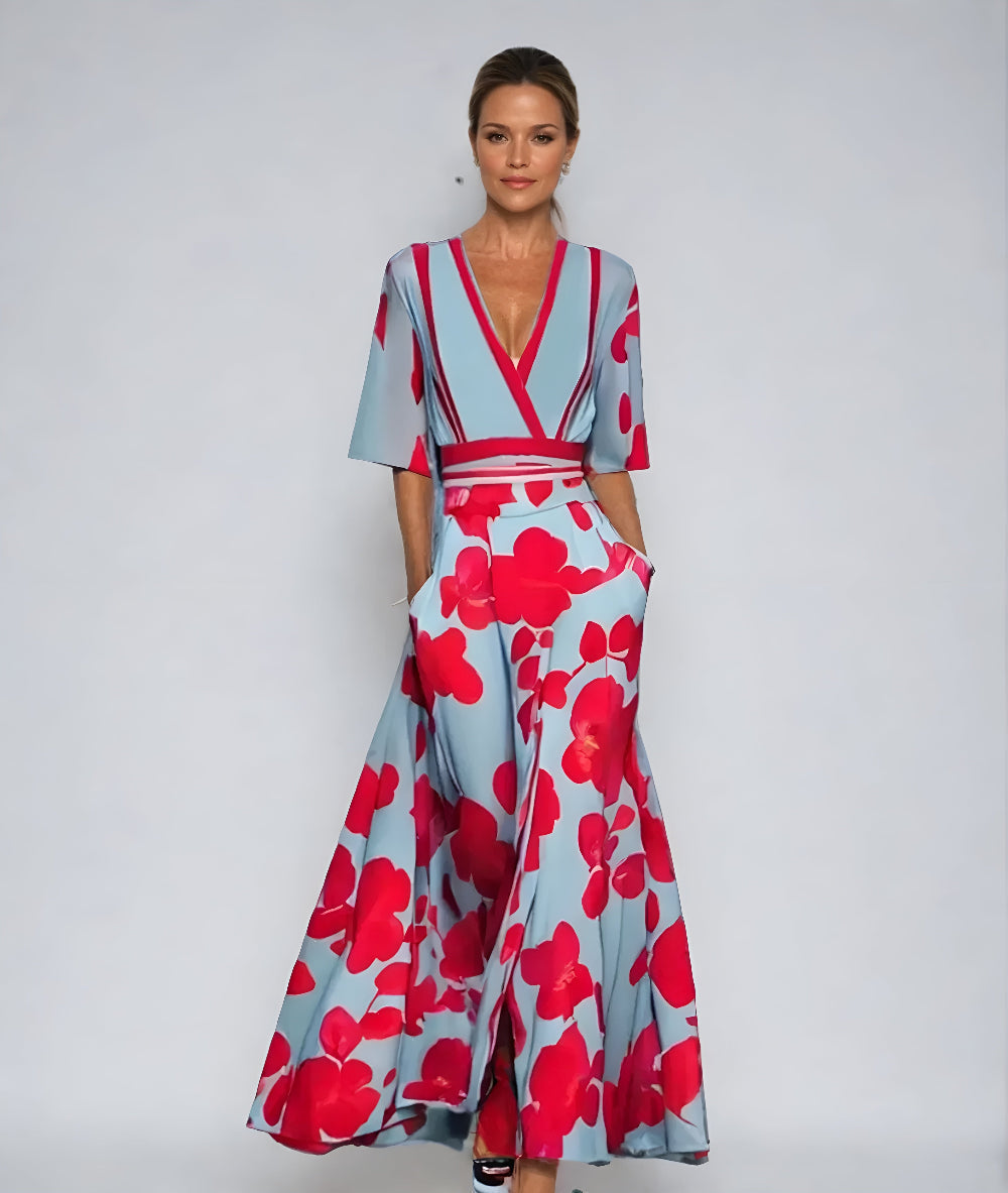 Jumpsuit Floral Azul Elegante para Mujeres con Cuello en V Cruzado, Mangas de Codo y Piernas Anchas con Cinturón
