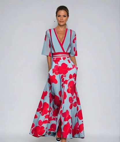 Jumpsuit Floral Azul Elegante para Mujeres con Cuello en V Cruzado, Mangas de Codo y Piernas Anchas con Cinturón