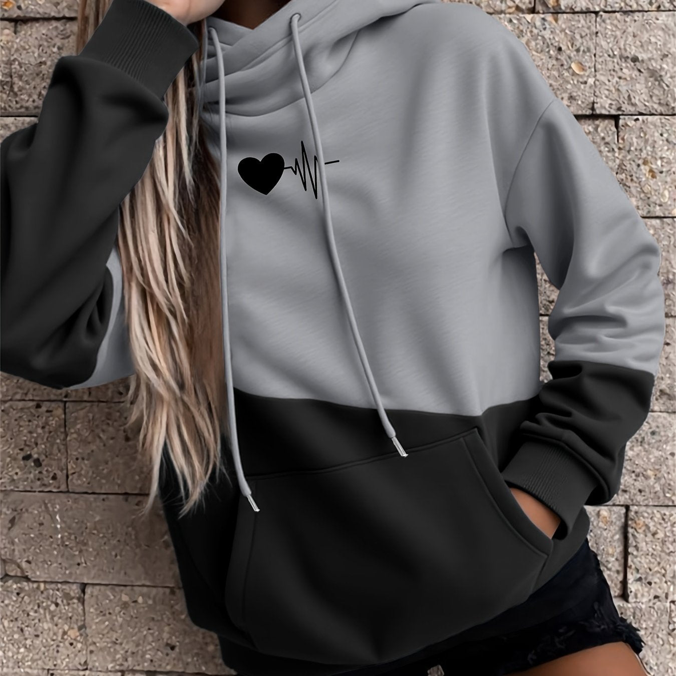 Sudadera cómoda con diseño colorblock y estampado de latidos para mujeres con capucha ajustable, manga larga y estilo de bolsillo canguro.