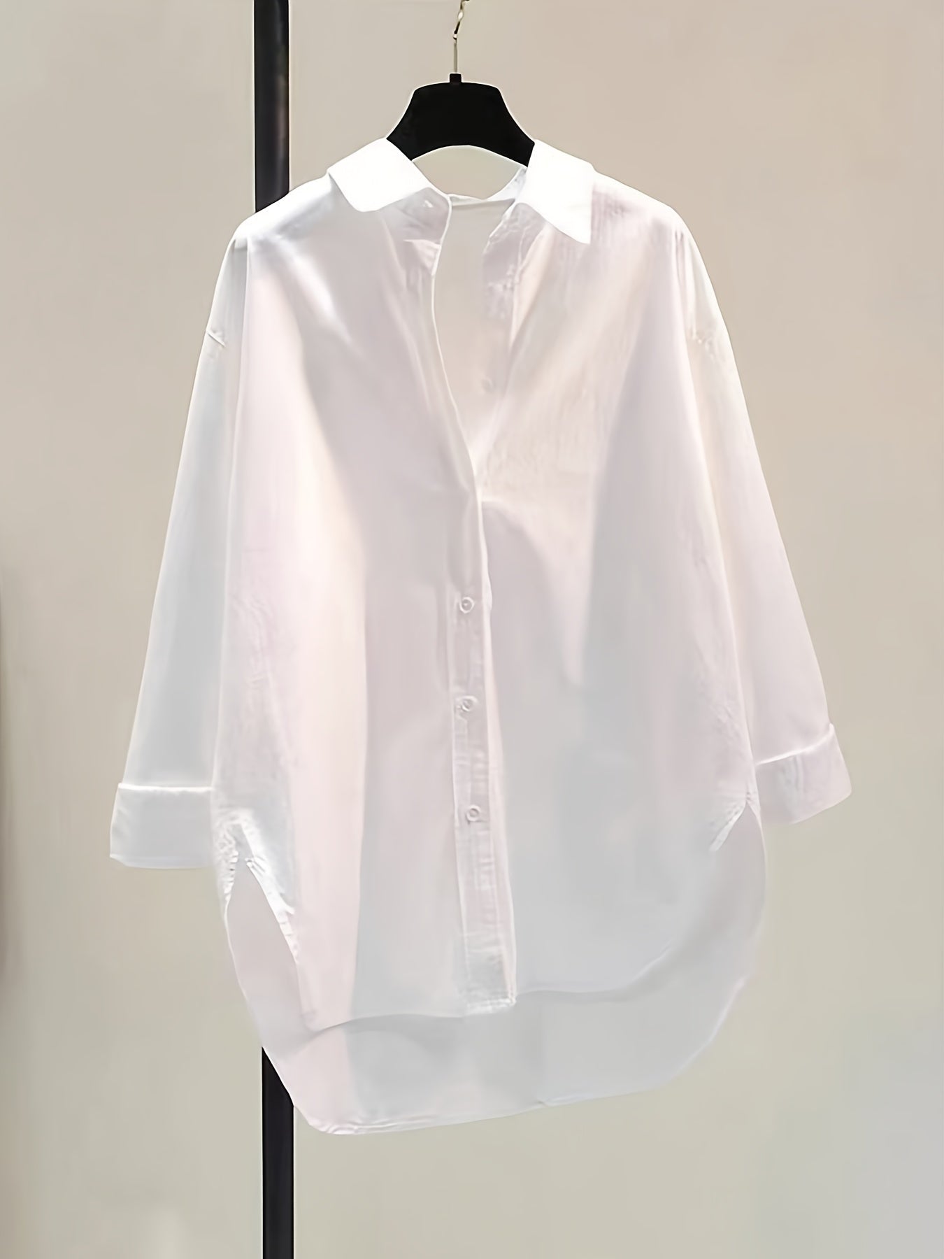Blusa de Algodón Sin Esfuerzo para Mujeres con Cuello de Punto, Manga Larga, Estilo Oversized y Bajo Irregular